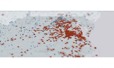 A map of the southern United States with scaled red dots indicating the respective slave populations in each area.