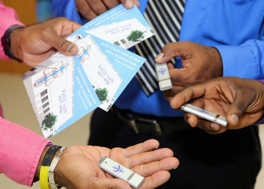 Radio Haiti flash drives and informational postcards at the Université d’État d’Haïti campus in Limonade, Haiti, June 2016.