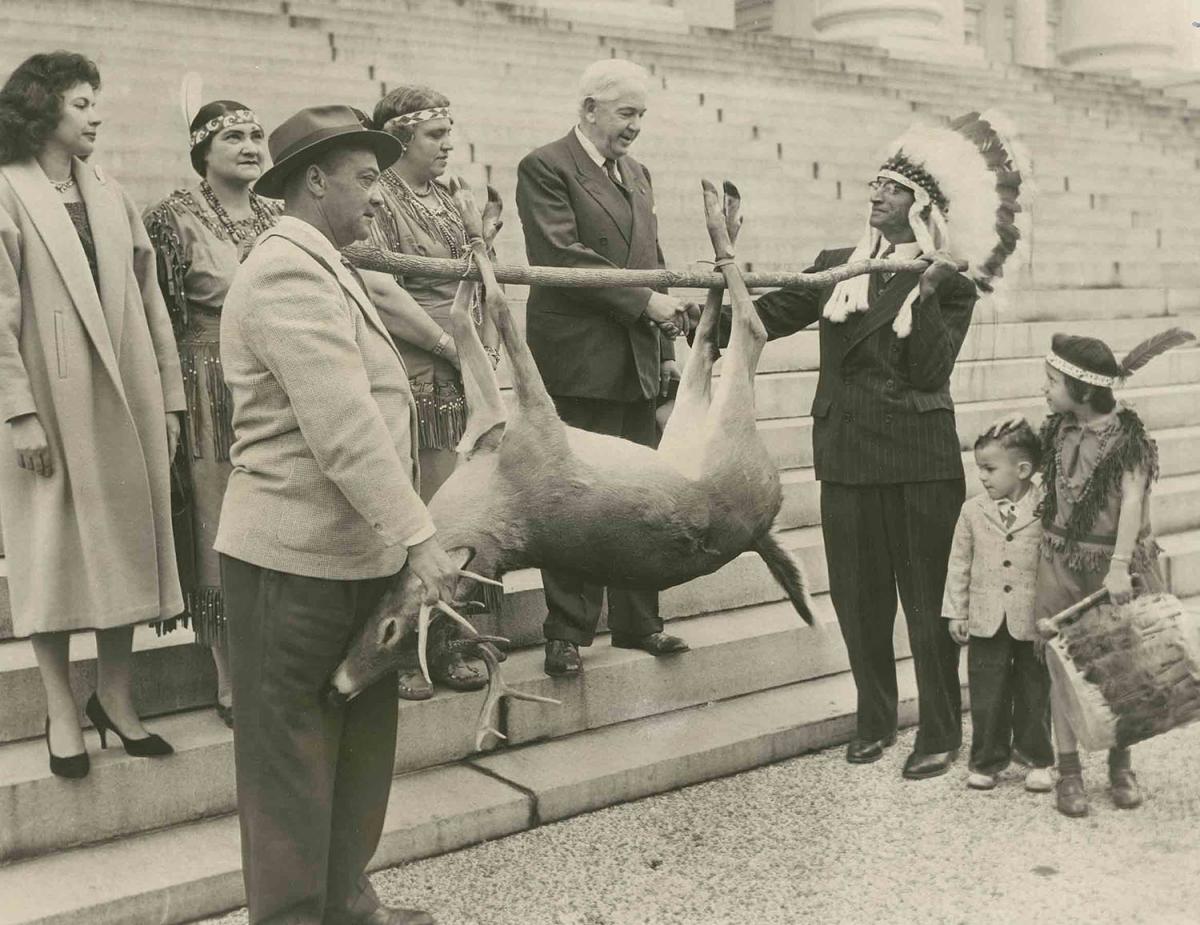 On view in the Virginia exhibition “Indigenous Perspectives” is this picture of Governor Albertis S. Harrison, who served from 1962 to 1966, receiving the annual tribute from the state’s tribes.  