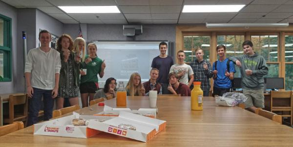 Students sitting around a table
