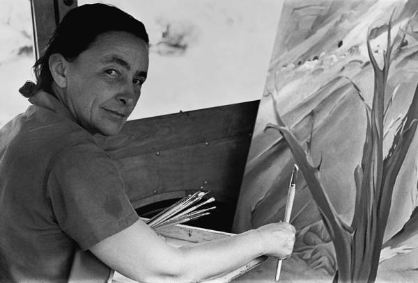 Georgia O'Keeffe at her easel