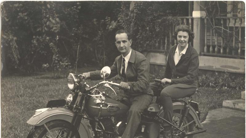 Boggs and Don Pepe, sitting on a motorcycle