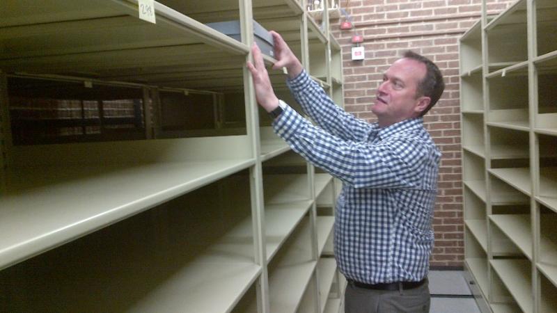 Man looking at shelves